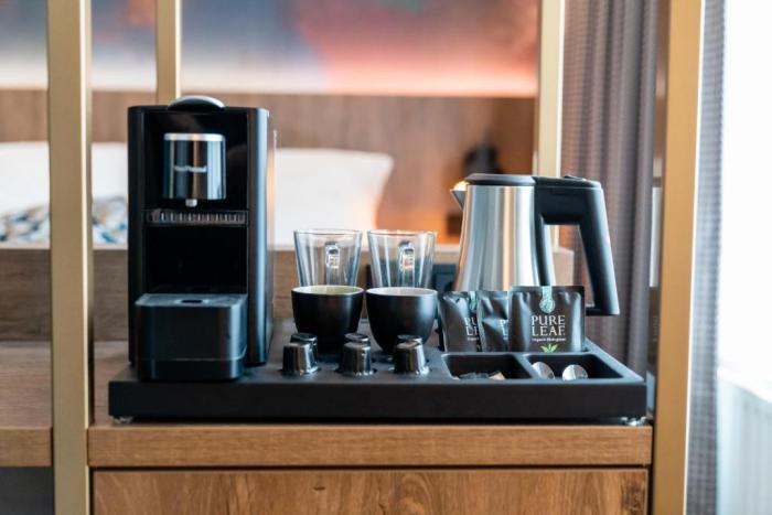 Hotel Haarhuis Арнем Номер фото A Nespresso coffee machine in a hotel room